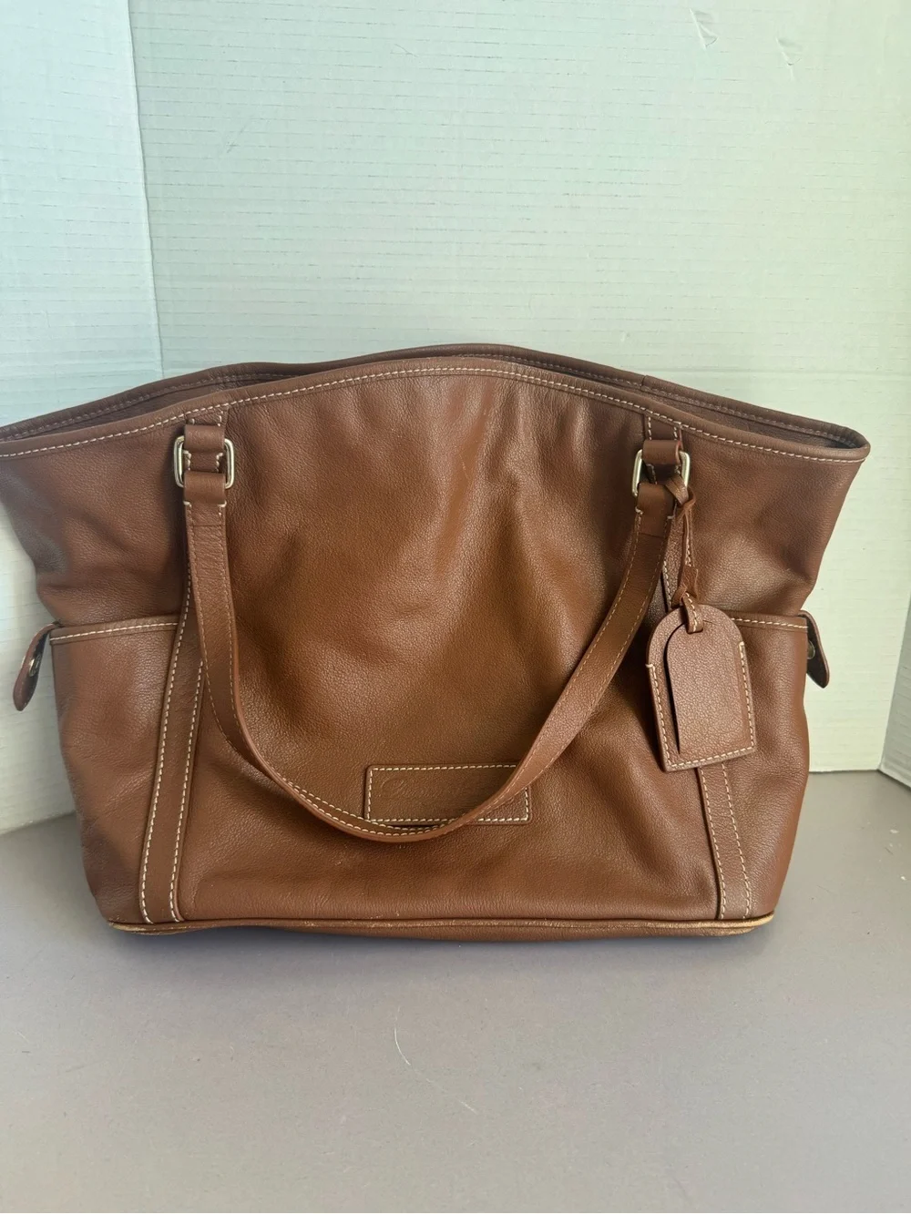 Dooney & Bourke Brown Leather Tote with Luggage Tag